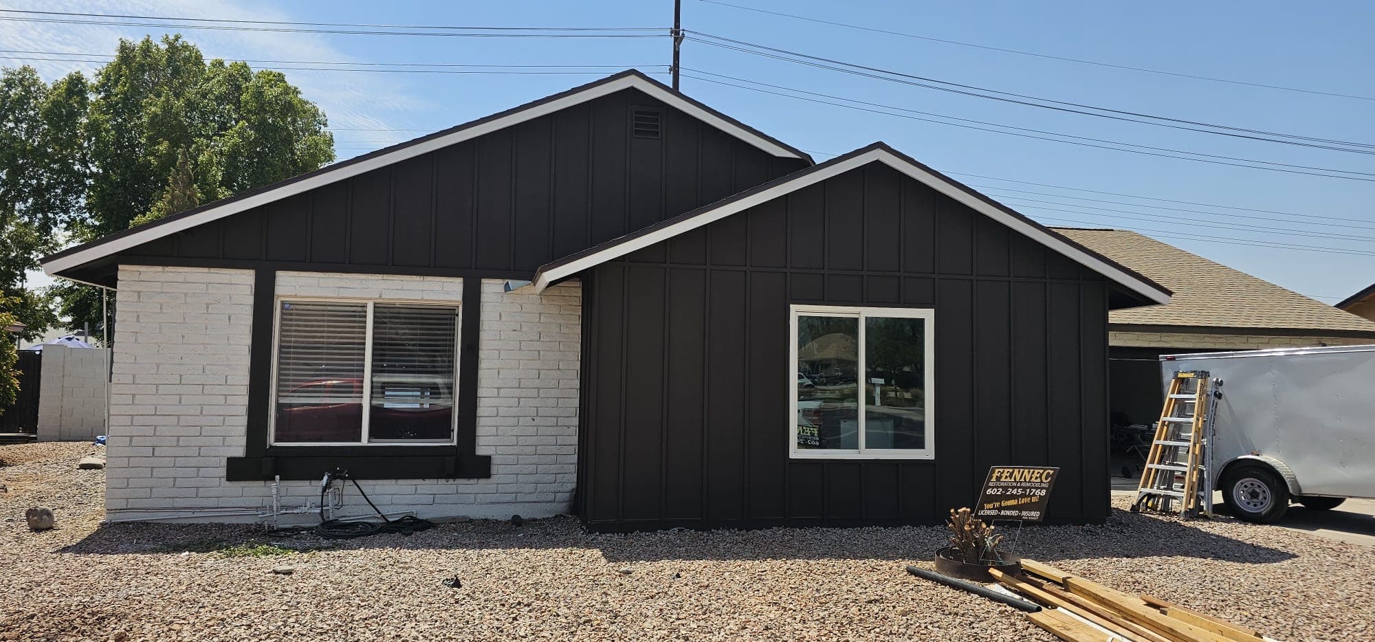 Covered addition with a standing-seam metal roof completed by Fennec Restoration in the Phoenix Valley